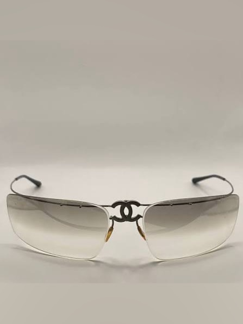 CHANEL Silver Rimless Shield Sunglasses with Gradient Lenses